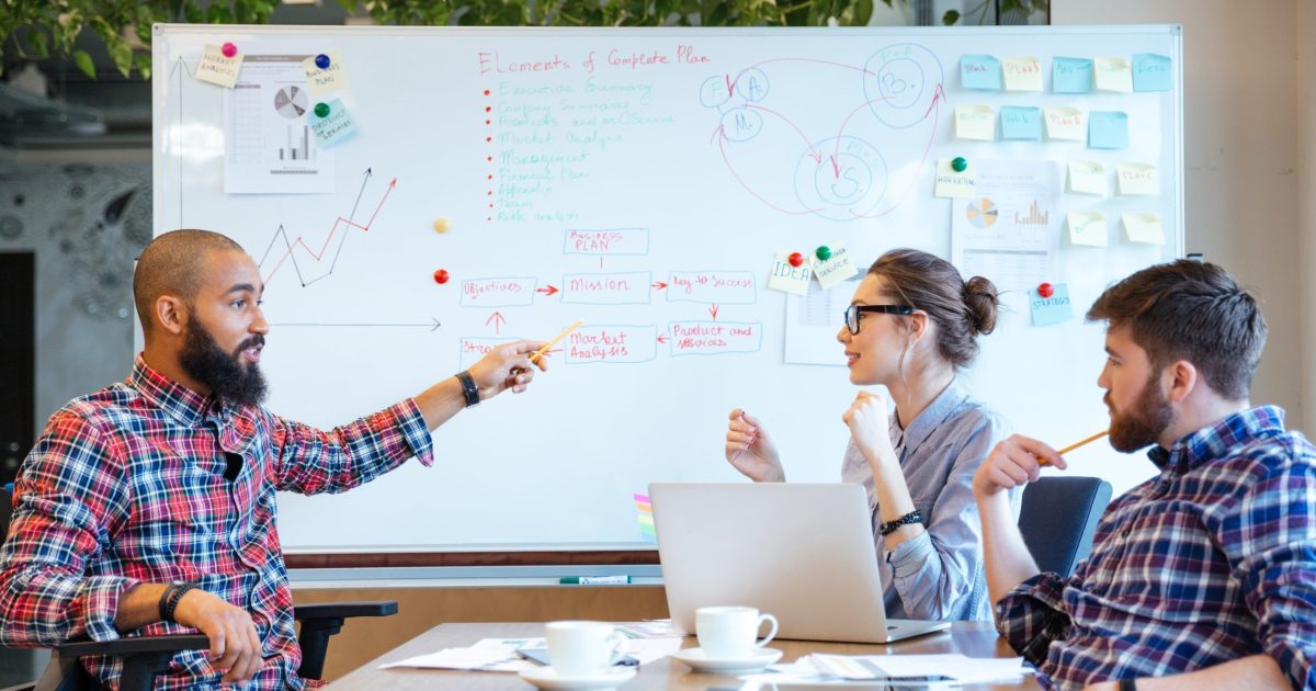 Multiethnic group of business people working together in office